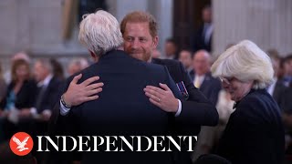 Prince Harry hugs family as he is supported by Princess Diana