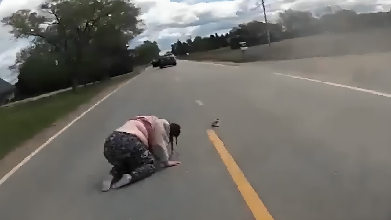 She Jumped Out of a Moving Car During Police Chase! - YouTube