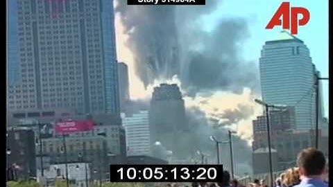 WTC Tower 1 collapse, AP below, north 2 - & West Side Hwy. north view by M.L.