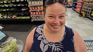 Stocking up on groceries at Meijer.. going over sale prices