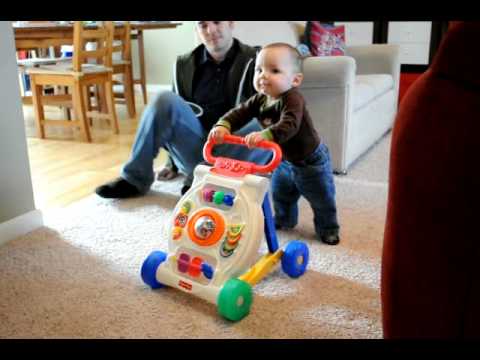 baby walking with push walker