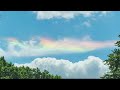 What causes rainbow clouds