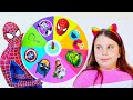 Mystery Wheel Superheroes and more funny challenges with Adriana and Ali