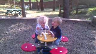 Emma and Daniel bouncing on teeter totter