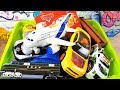 Box full of toy cars and plane