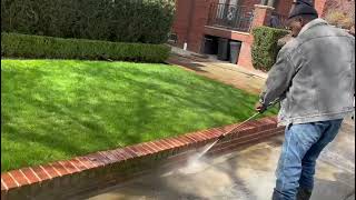 Pressure washing sidewalk and patio