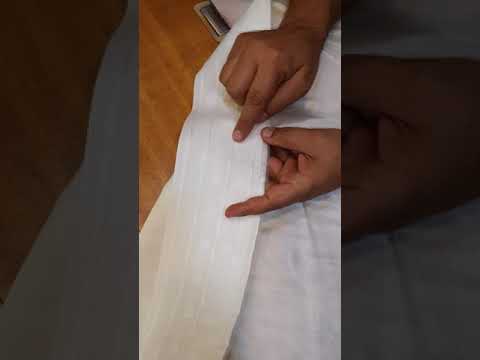 فيديو: كيفية خياطة الستائر بقذيفة