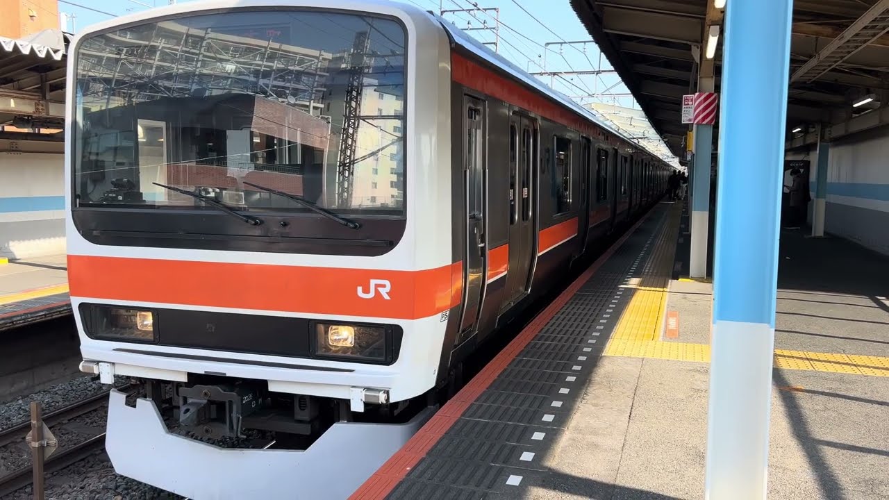 209系500番台M77編成武蔵野線各駅停車府中本町行きがJR新松戸駅3番線を発車するシーン 2026.2.23