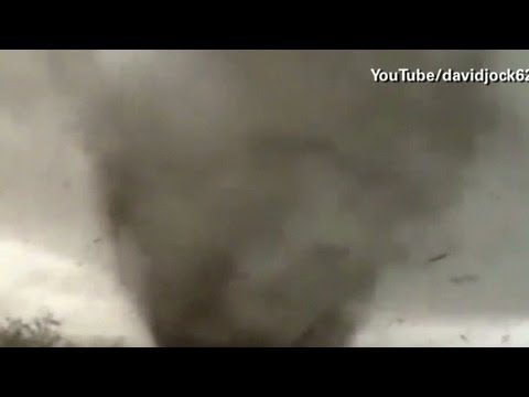 Driver tries to outrun massive tornado - YouTube