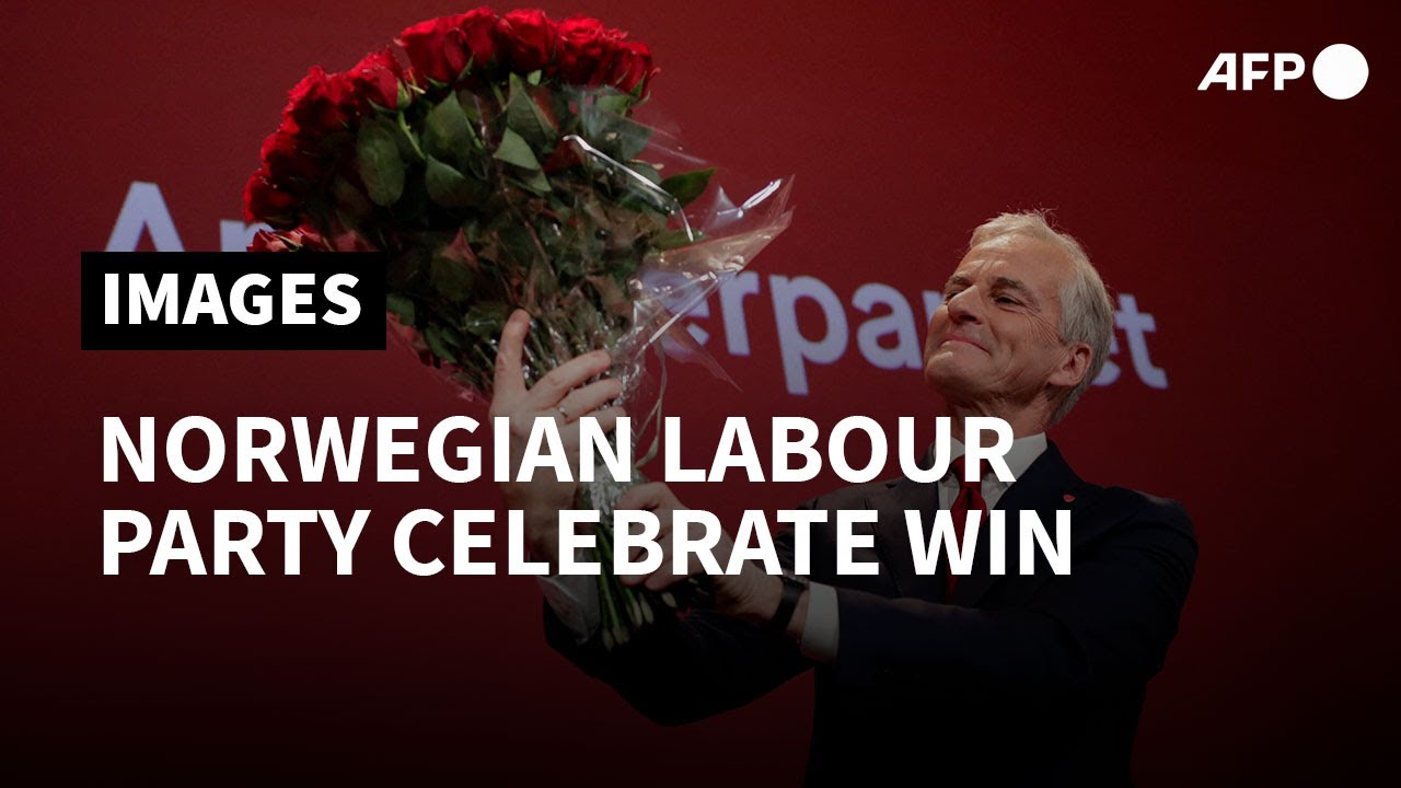 Norwegian Labour Party supporters cheers as initial election results