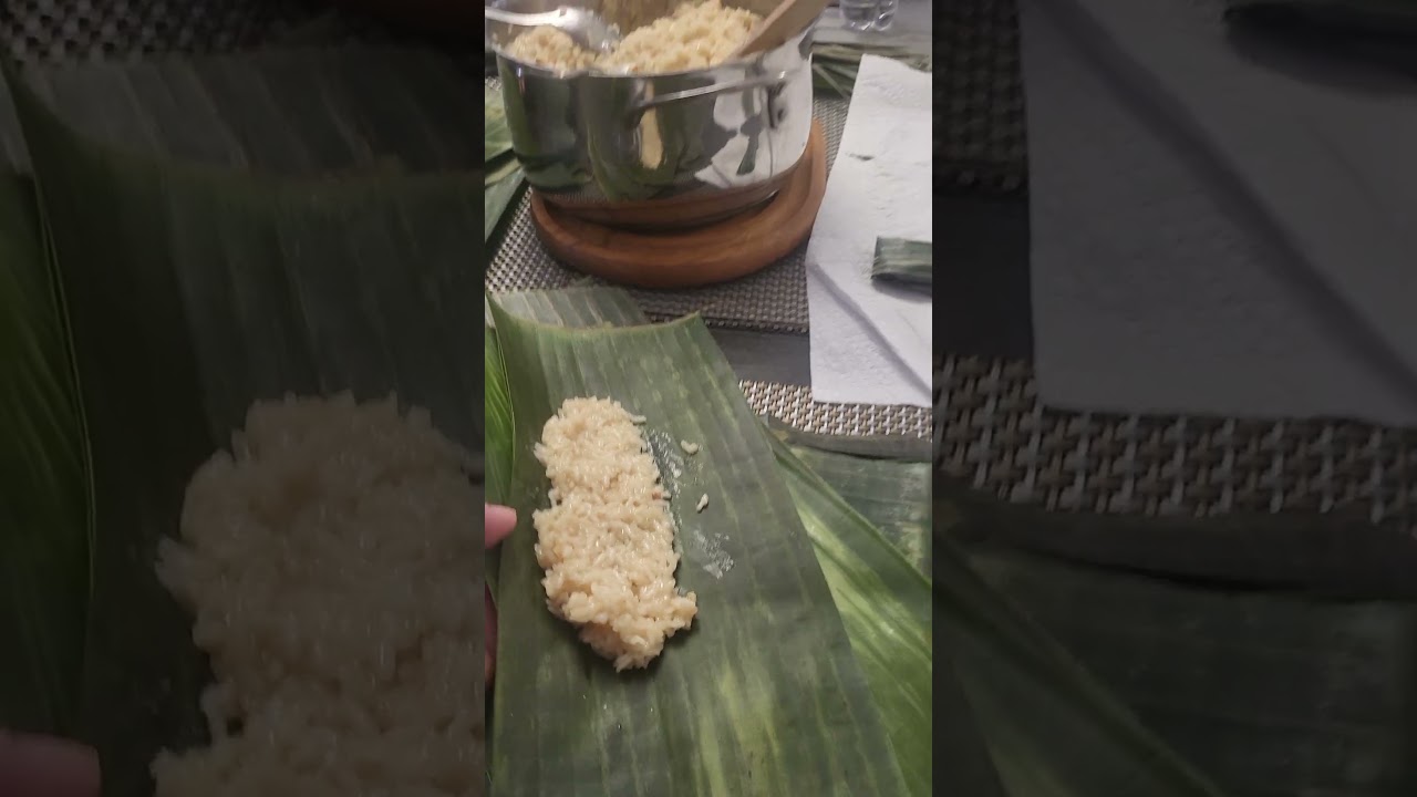 cooking suman for dessert(sticky rice with coconut milk and brown sugar with ginger