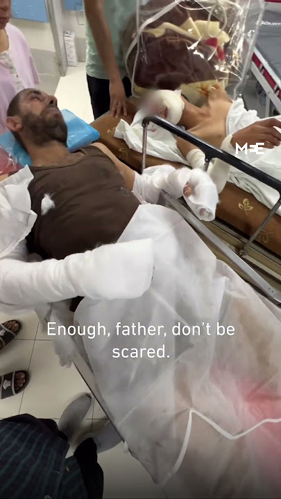 “Don’t be scared, father” - A moment between a Palestinian boy and his father in Gaza hospital