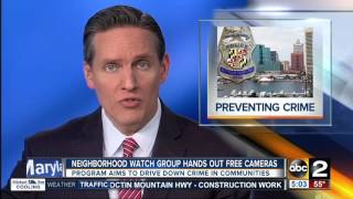Neighborhood watch group hands of free cameras in Baltimore