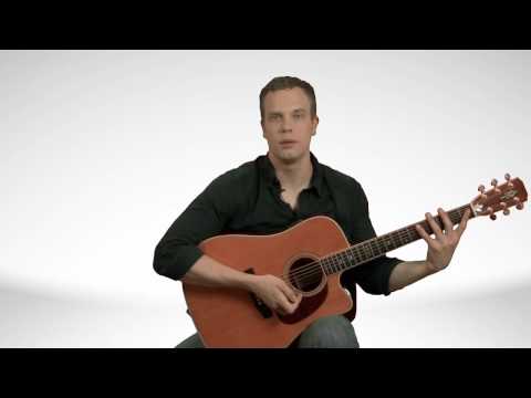 How To Hold An Acoustic Guitar - Guitar Lessons