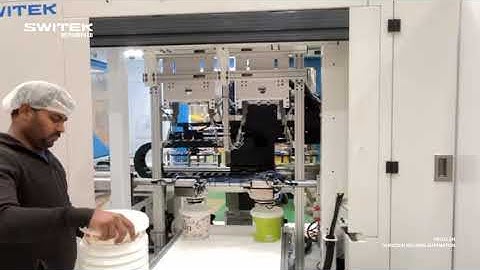 SWITEK AUTOMATION IML BUCKET HANDLE ASSEMMBLY AUTOMATION SOLUTION