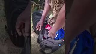 Police officers in Ol Kalou were forced to open their bags for frisking by the residents!