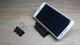 How to easily and quickly make a stand for a smartphone from binder clips.