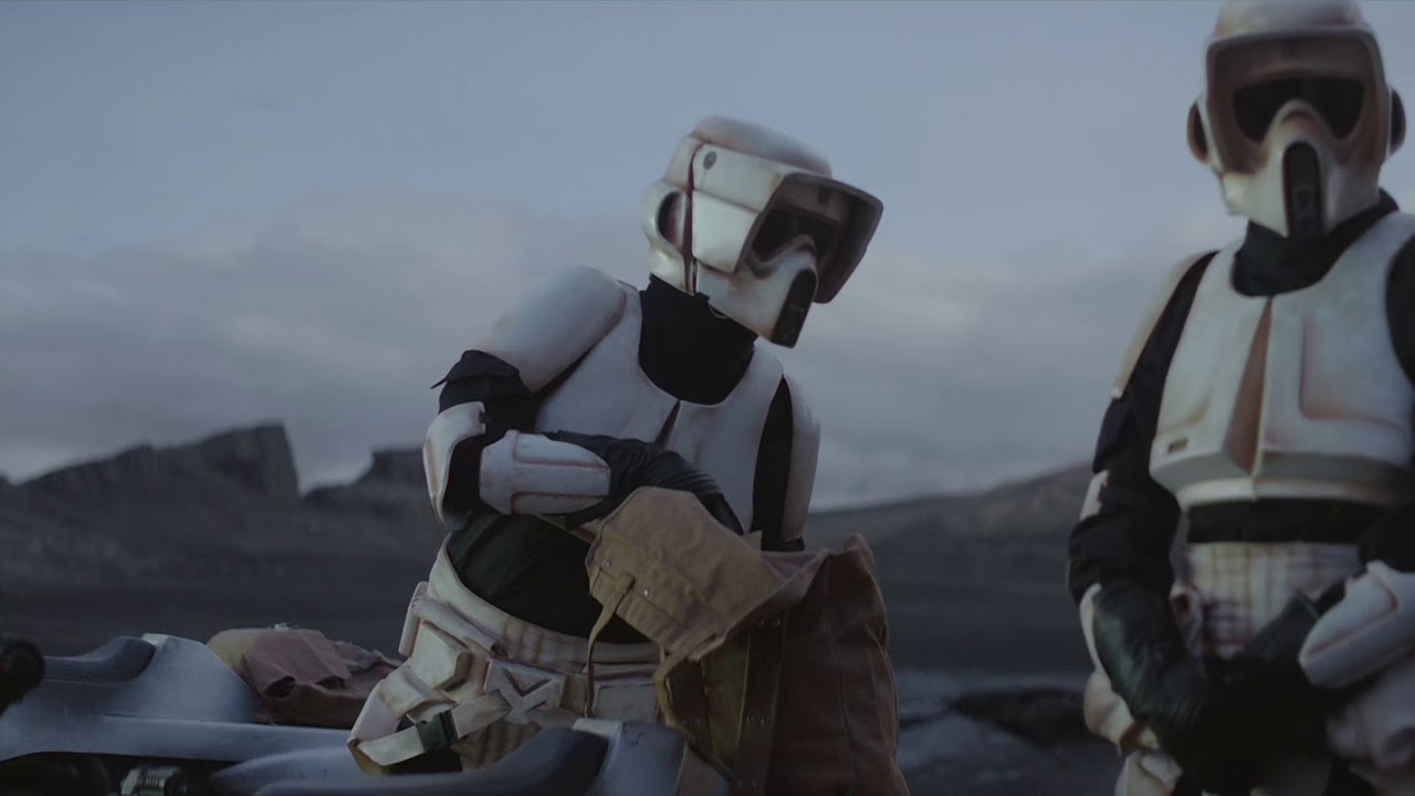 Baby Yoda gets punched in the face. The Mandalorian