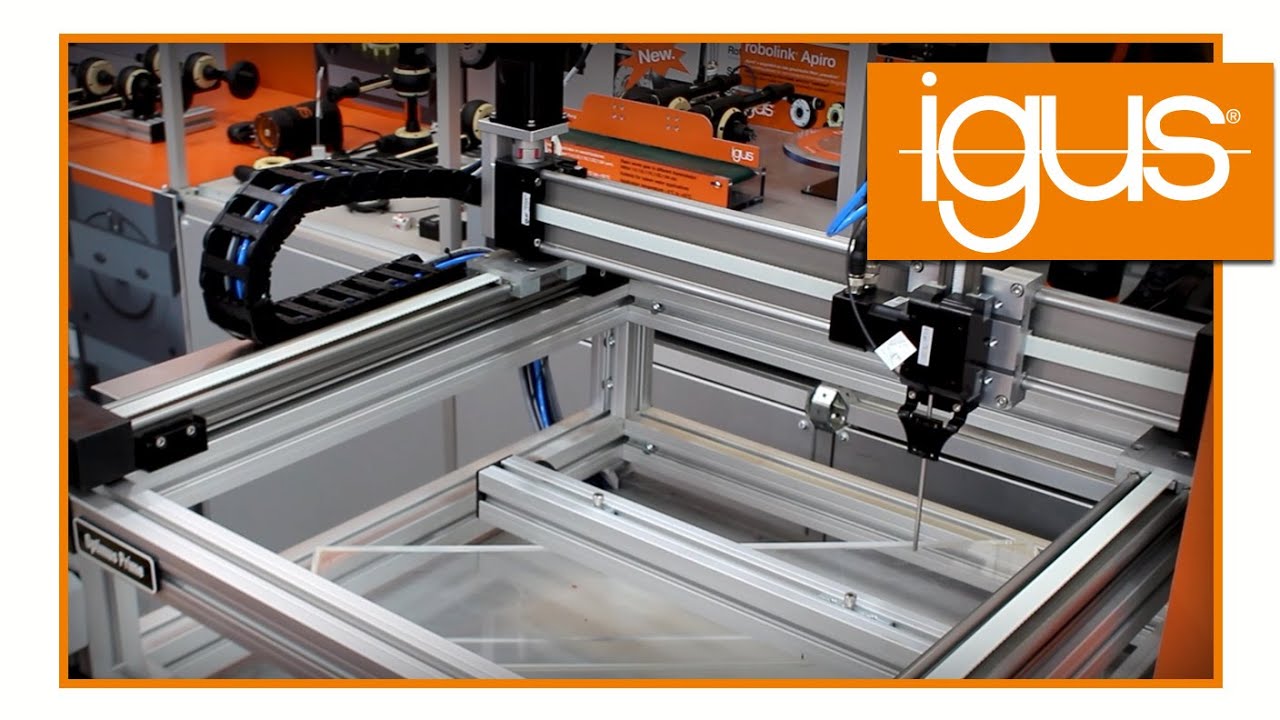 Präzise Pick & Place- Anwendungen mit drylin® Raumportalroboter (XYZ-Roboter)