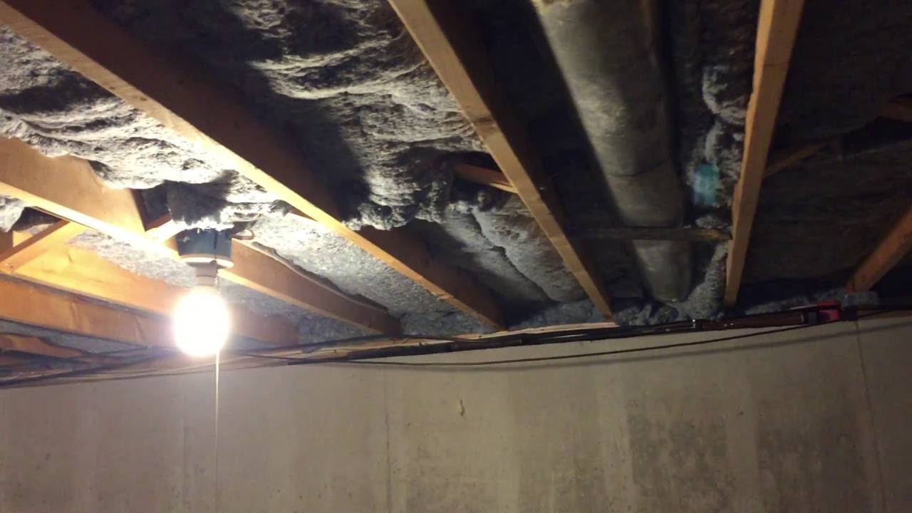 Installing Denim Insulation In A Natick Ma Basement Ceiling