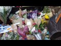 People paying tribute and mourning at George Michael&#39;s London residence