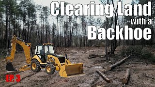 Clearing Land with a backhoe part 3