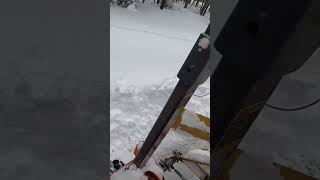 Kubota B2920 digging out the driveway and piling the snow up…