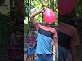 The challenge of popping a balloon with a needle while closing your eyes.🎊#shorts