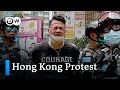 Hong Kong police enforces first arrests under new security law | DW News