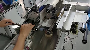 Automatic sausage labeling machine