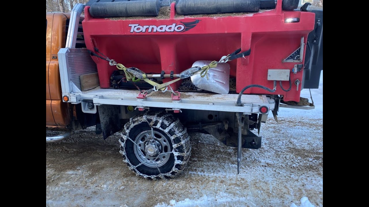 Maine snowplowing (w/tire chains) what others won't, driveway hasn't