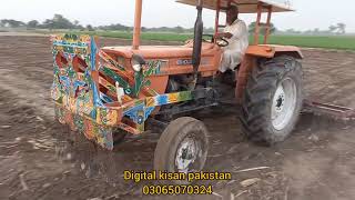 sabz charay ki bijai alghazi tractor k sath....