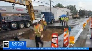 Sinkhole opens on Baldwin road after sewer pipe cracks