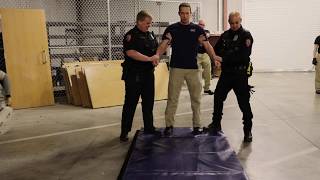 Officer in training Riddle being exposed to the Taser X2