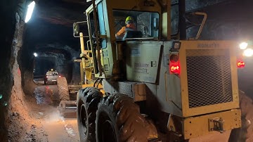 Komatsu GD521A Grader Cleaning The Main Roads Of Underground Bauxite Mine - Interkat SA