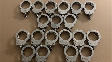 Peerless vs Smith & Wesson old style handcuffs. 