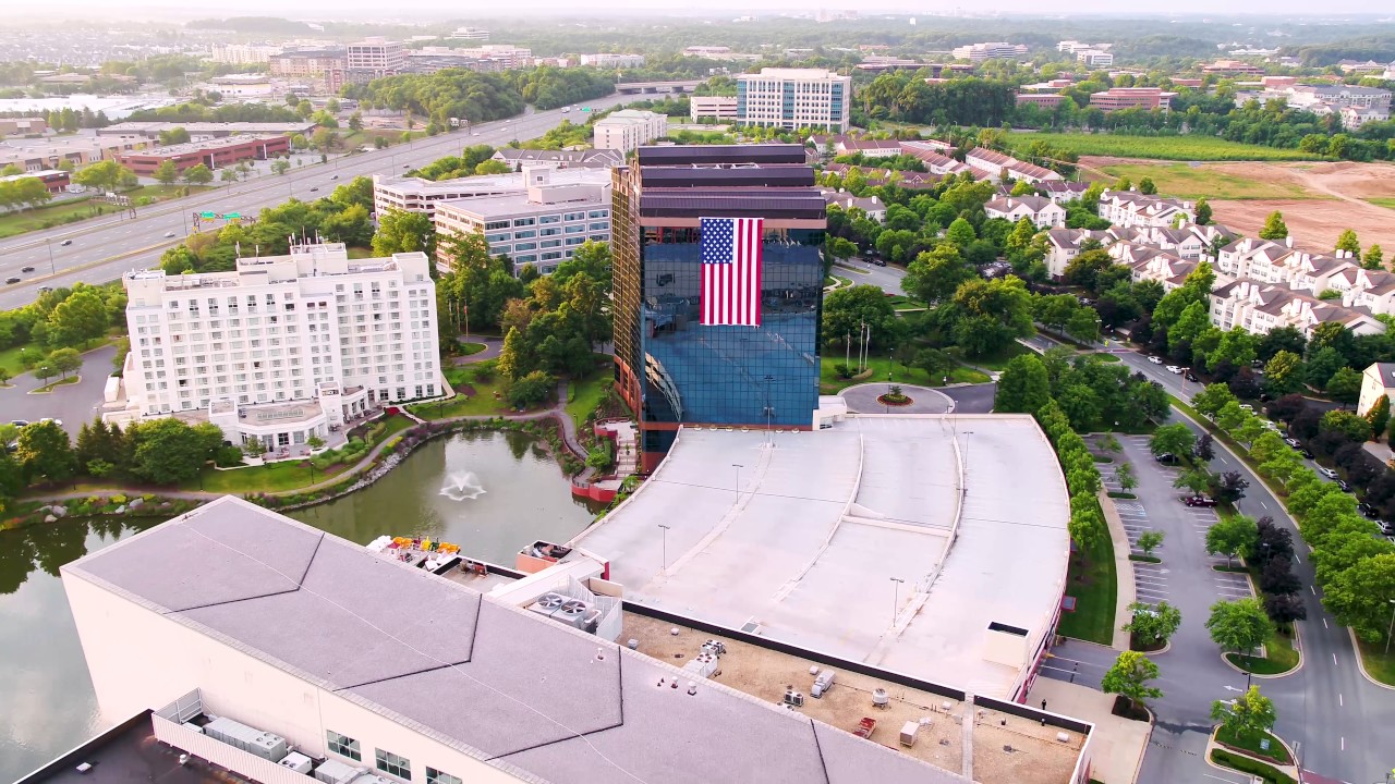 American Flag to National Anthem Fade-Away Aerial Video