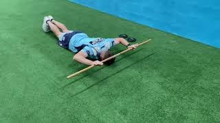 Prone dowel overhead press
