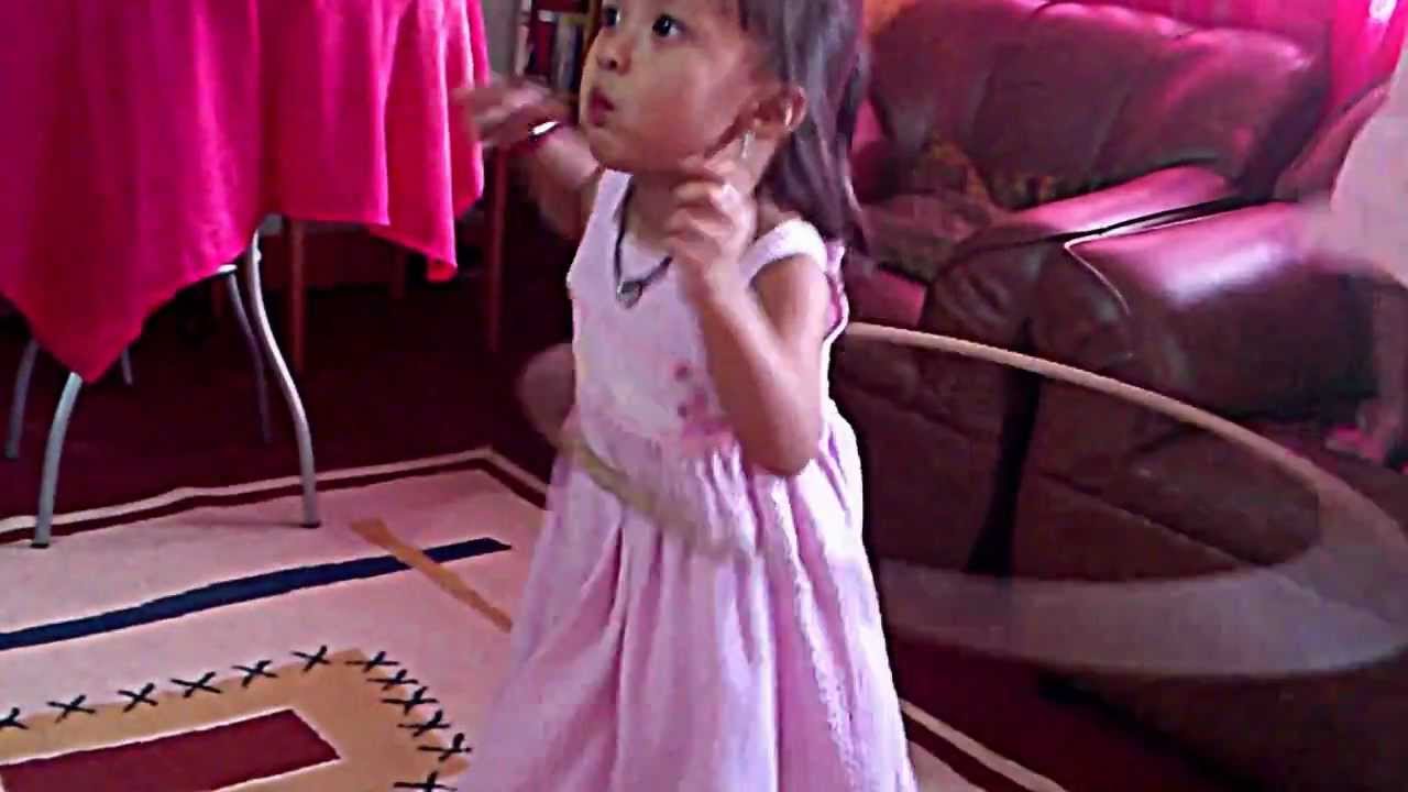 Cute little hulahoop girl in 1 minute