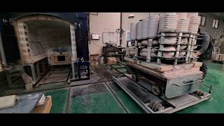 Loading a Pottery Kiln with Clay Pots