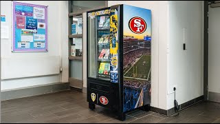 San Francisco 49ers Donate Book Vending Machines to Two Partner Schools in Leeds