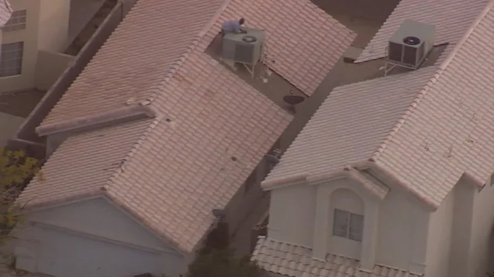 Police talk man down from rooftop