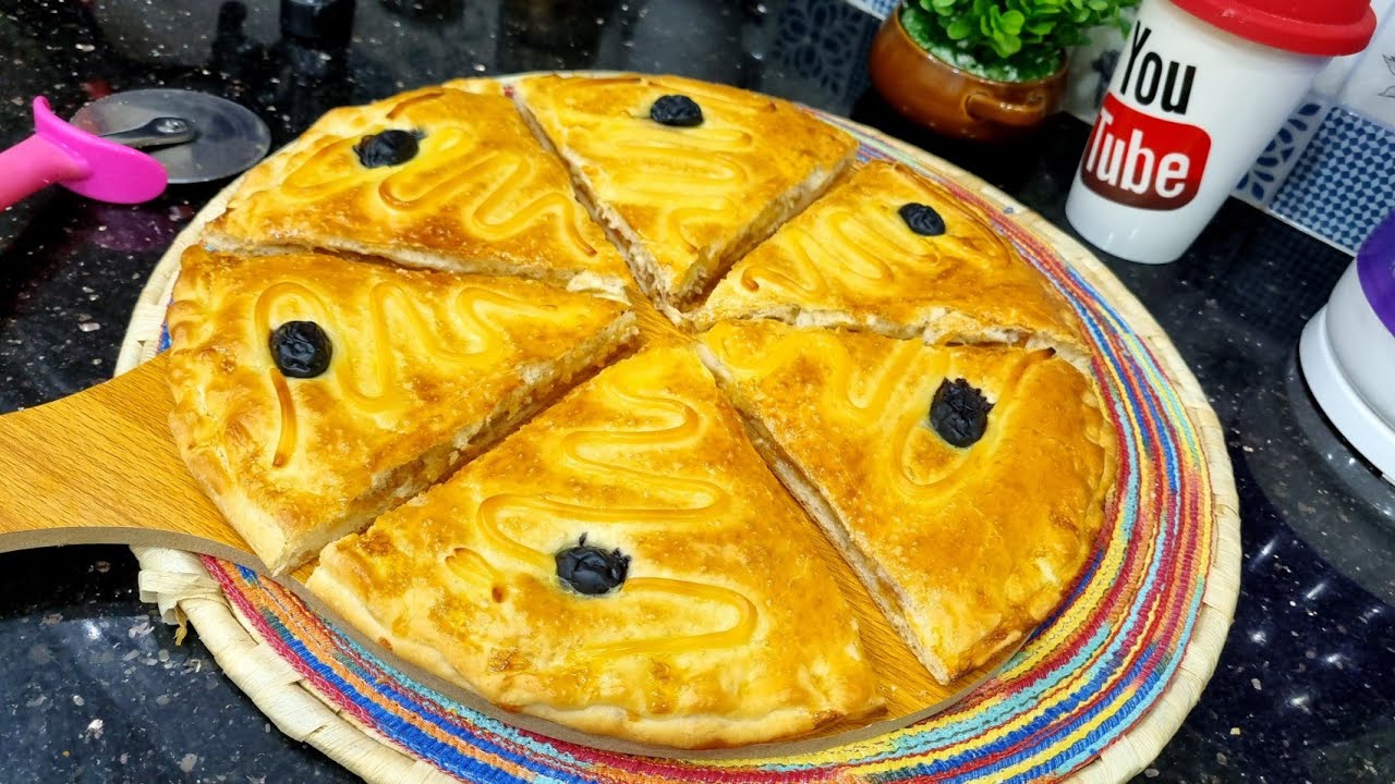 مطبخ ام وليد / بيتزا 🍕كوفار ب 2كاس فرينة ، سهولة و بساطة في التحضير👌 و النتيجة و لا اروع 😋 .