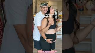 Holding up my pregnant wife s belly