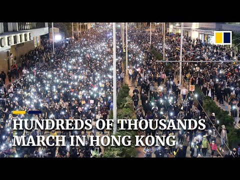 Hundreds of thousands joined Hong Kong’s first march approved by police since August