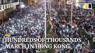 Hundreds of thousands joined Hong Kong’s first march approved by police since August