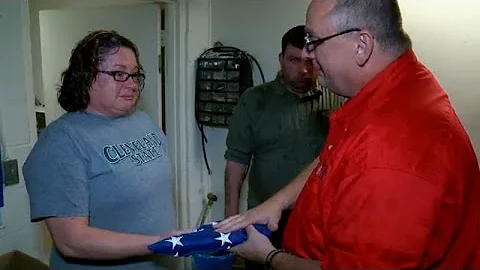Harold Morgan's daughter presented with flag
