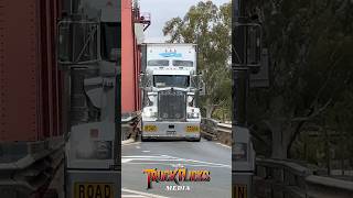 WFM Kenworth T909 roadtrain coming off the Paringa Bridge. No room to spare! 💪