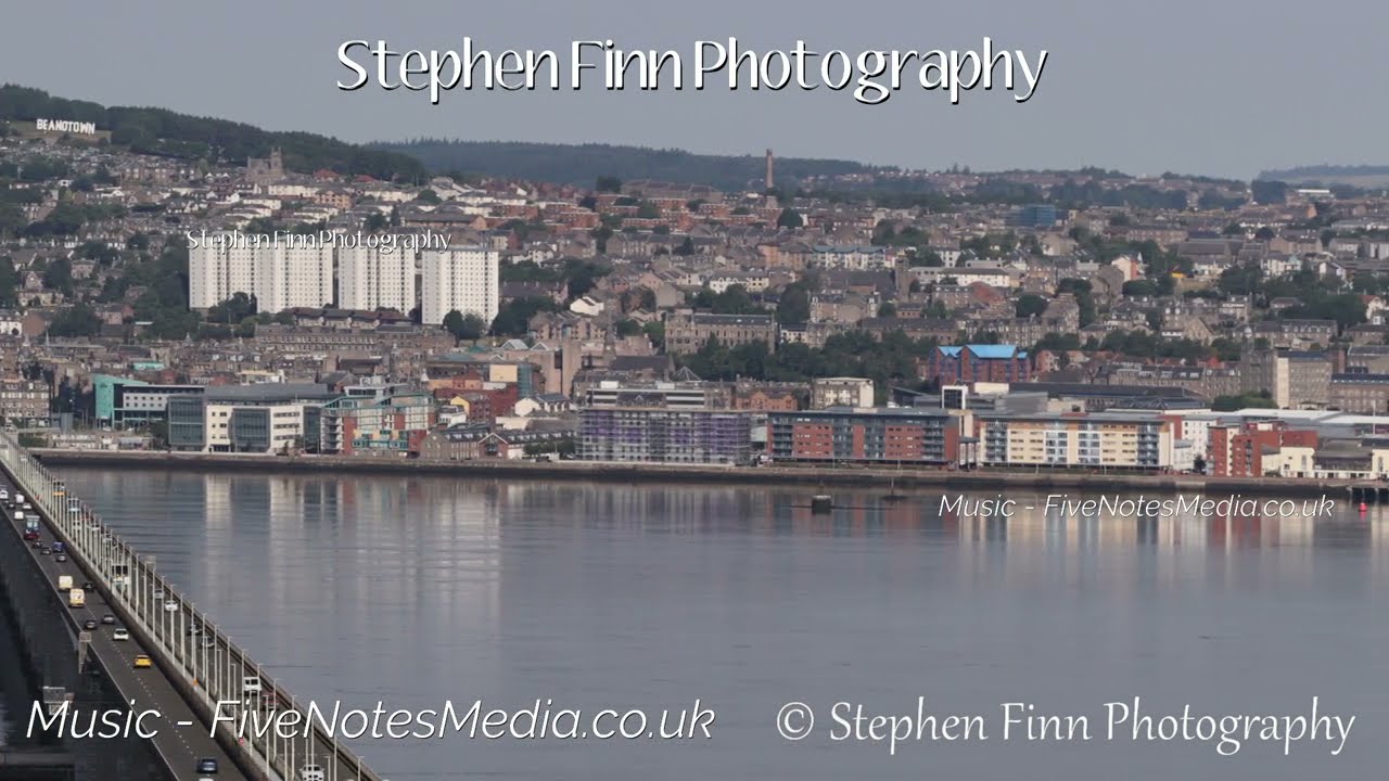 Dundee waterfront with Beanotown Sign and cruise ship Monday 18th July 2022