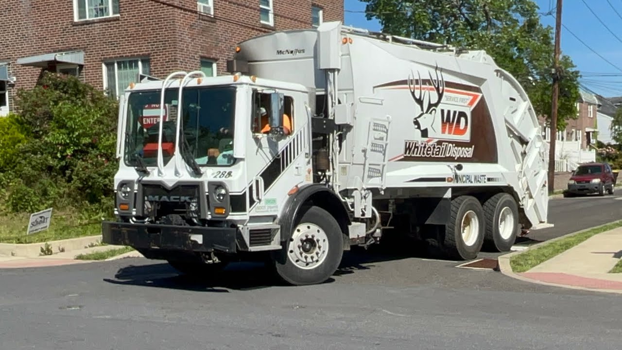 whitetail-disposal-mack-mru-mcneilus-rear-loader-with-the-orange-logo